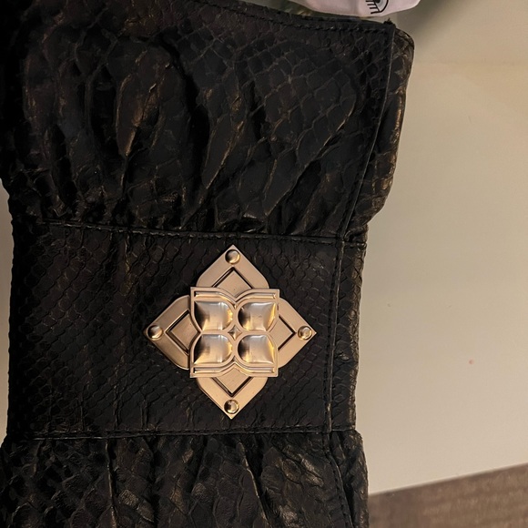 Brand new BCBG purse in black and gold flower buckle - Picture 2 of 6